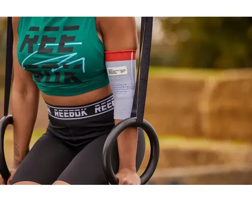 Фіксатор для ліктя Reebok Speedwick Elbow Support розмір S, сіро-червоний