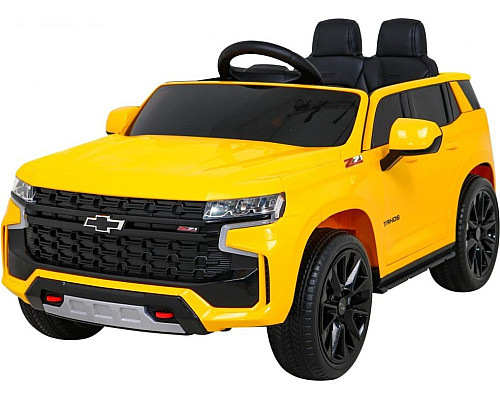 Дитяча акумуляторна машинка Chevrolet Tahoe Жовта Дитяча акумуляторна машинка Chevrolet Tahoe Жовта