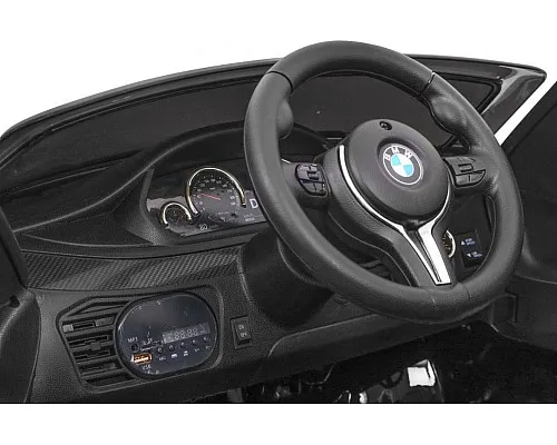 Дитяча акумуляторна машинка BMW X6M Чорна Дитяча акумуляторна машинка BMW X6M Чорна